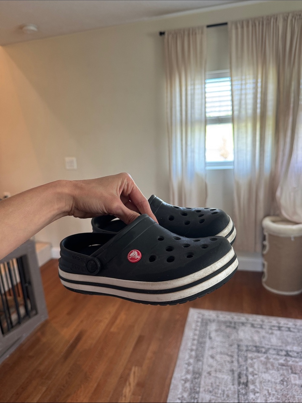CROCS Black Clog with White Striped Midsole and Red Logo